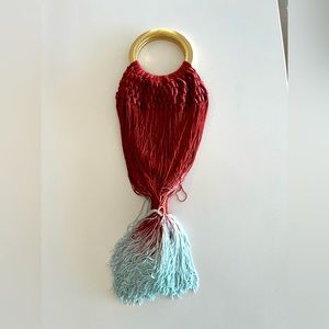 Cult Gaia Angelou macramé-detail bag. Open top and knotted tassel accent.